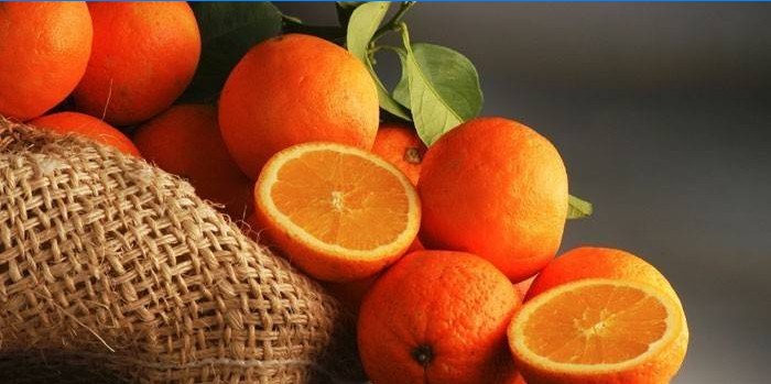 Appelsiner, hele og halvdeler