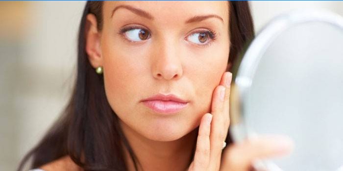 Årsaker til utseendet til ansiktshår hos kvinner