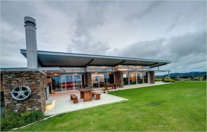 Hus blant åsene-landskapsprosjekt Okura Fra Bossley, New Zealand