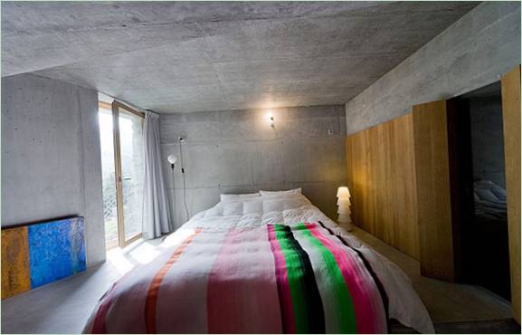 Design av soverommet til et ovalt underjordisk hus I Sveits