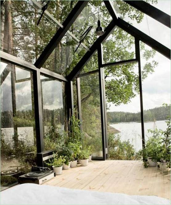 Interiørdesign av et glass hagehus: rekreasjonsområde